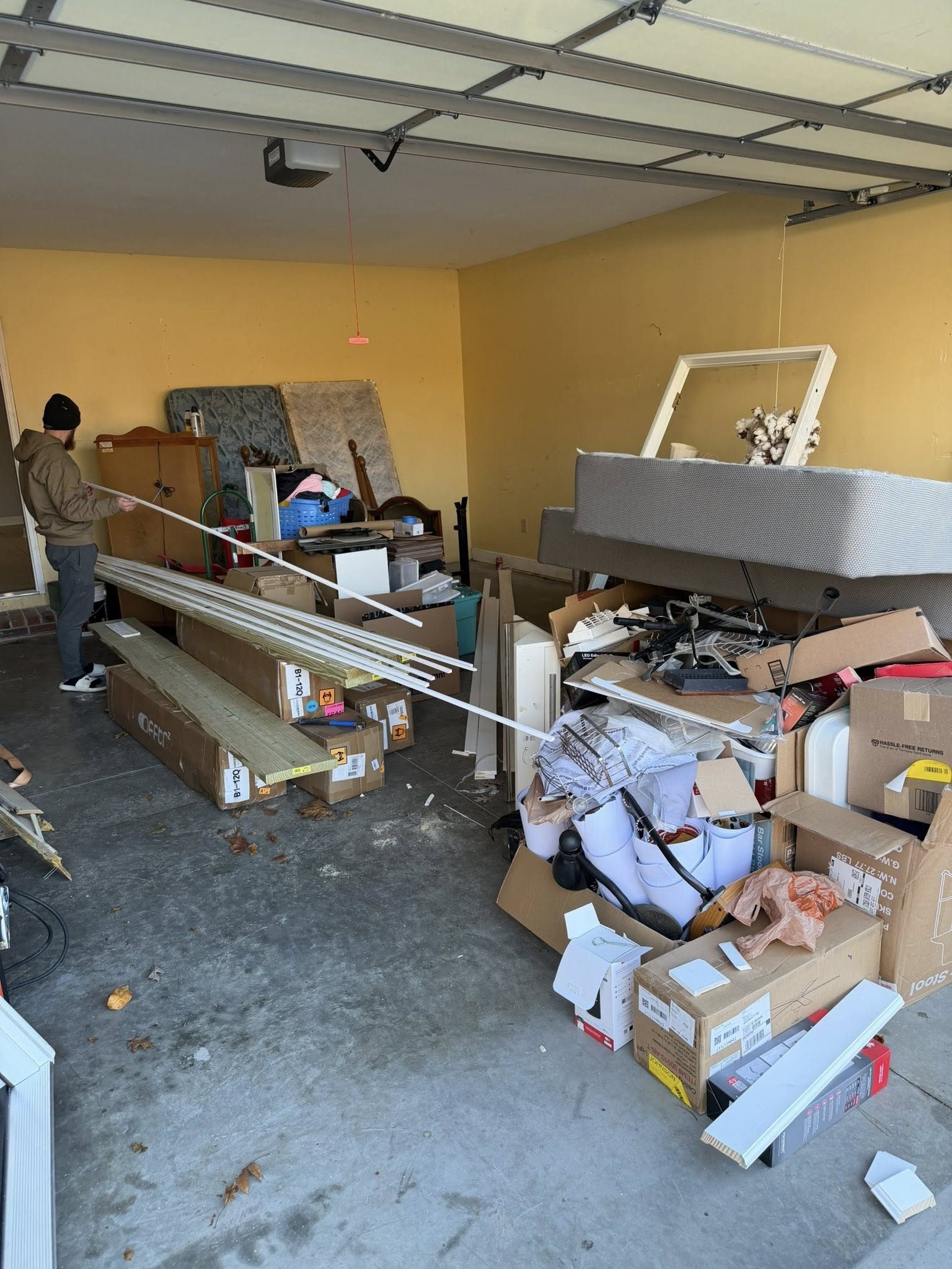 Garage Cleanout before junk removal by Coyles on Call