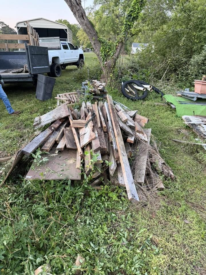 Wood pile and lumber removal with truck