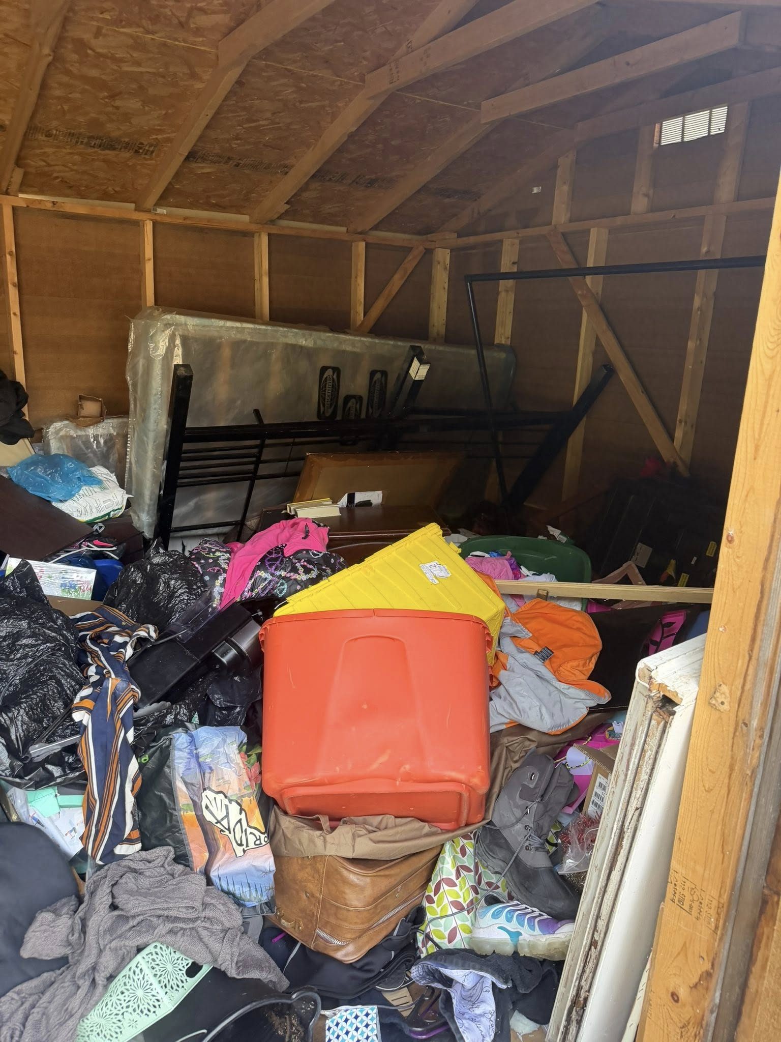 Packed shed interior before cleanout