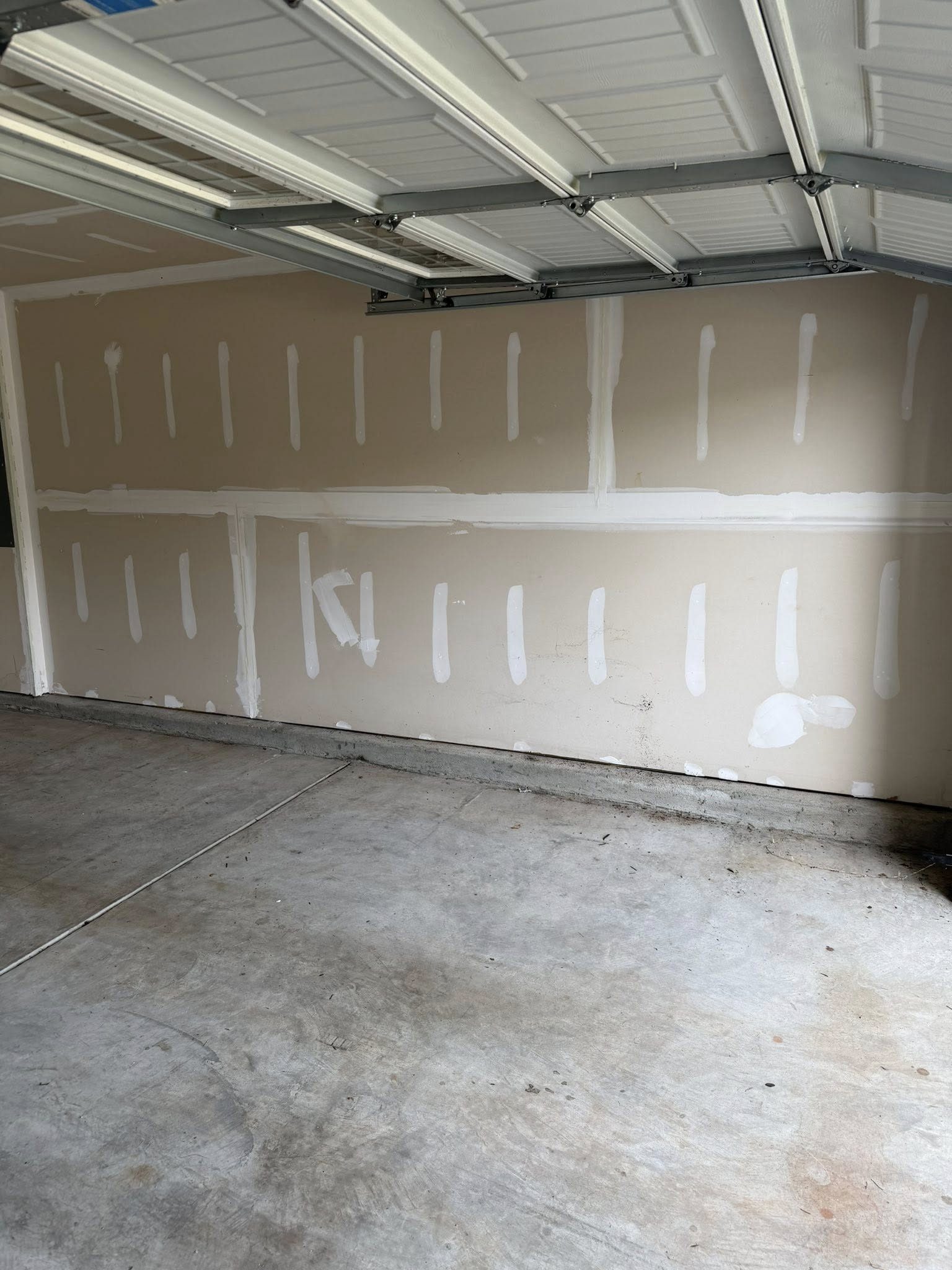 Space cleared after garage cleanout by Coyles on Call